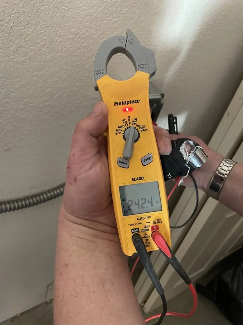 Voltage testing with clamp meter during Generator Installation in Brentwood